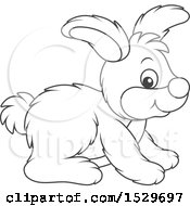 Clipart Of A Black And White Cute Rabbit Royalty Free Vector Illustration