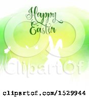 Poster, Art Print Of Happy Easter Greeting With A Silhouetted Bunny Rabbit And Eggs Against Green Watercolor