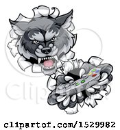 Clipart Of A Mad Wolf Mascot Holding A Video Game Controller And Breaking Through A Wall Royalty Free Vector Illustration