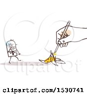 Hand Sketching A Stick Business Man Talking On A Cell Phone And Approaching A Banana Peel