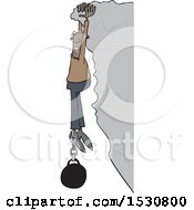 Cartoon Black Man Hanging From A Cliff With A Ball And Chain Attached To His Ankle