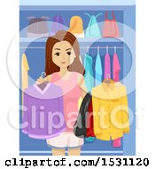 Teen Girl Holding Clothes In A Closet