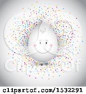 Clipart Of A Happy Face On An Easter Egg Over Confetti On A Shaded White Background Royalty Free Vector Illustration