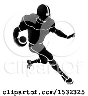 Clipart Of A Silhouetted Black And White Football Player Charging Royalty Free Vector Illustration by AtStockIllustration