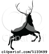 Clipart Of A Black Silhouetted Deer Stag Buck Rutting Royalty Free Vector Illustration