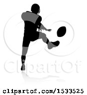Clipart Of A Silhouetted American Football Player Kicking A Ball With A Reflection Or Shadow Royalty Free Vector Illustration