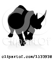 Poster, Art Print Of Silhouetted Charging Rhino With A Shadow On A White Background
