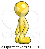 Yellow Design Mascot Man Kneeling Angle View Left