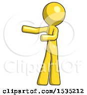 Yellow Design Mascot Man Presenting Something To His Right