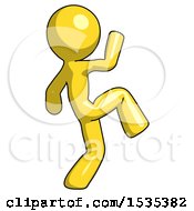 Yellow Design Mascot Man Kick Pose Start