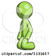 Green Design Mascot Man Kneeling Angle View Left
