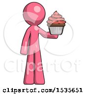 Pink Design Mascot Man Presenting Pink Cupcake To Viewer