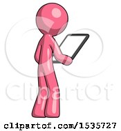 Pink Design Mascot Man Looking At Tablet Device Computer Facing Away