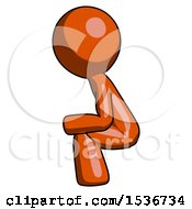Orange Design Mascot Man Squatting Facing Left
