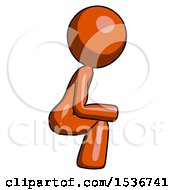Orange Design Mascot Woman Squatting Facing Right