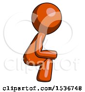 Orange Design Mascot Man Squatting Facing Right