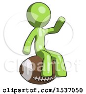 Green Design Mascot Man Sitting On Giant Football