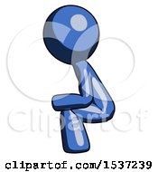 Blue Design Mascot Man Squatting Facing Left