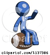 Poster, Art Print Of Blue Design Mascot Man Sitting On Giant Football