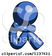 Blue Design Mascot Man Sitting With Head Down Facing Sideways Right