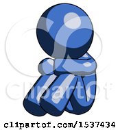 Blue Design Mascot Man Sitting With Head Down Facing Angle Left