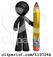 Black Design Mascot Man With Large Pencil Standing Ready To Write