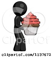 Black Design Mascot Man Holding Large Cupcake Ready To Eat Or Serve