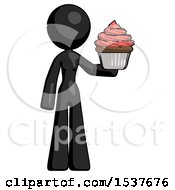 Black Design Mascot Woman Presenting Pink Cupcake To Viewer