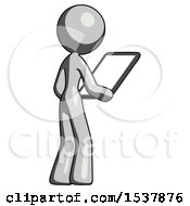 Gray Design Mascot Woman Looking At Tablet Device Computer Facing Away