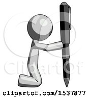 Gray Design Mascot Man Posing With Giant Pen In Powerful Yet Awkward Manner