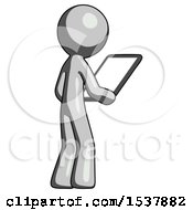 Poster, Art Print Of Gray Design Mascot Man Looking At Tablet Device Computer Facing Away
