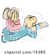 Little Blond Girl With Her Hair Up In Pigtails Wearing Pink Pajamas Sitting Cross Legged By Her Blond Brother Who Is Wearing Blue Pjs And Using A Tv Remote Control While Lying On His Stomach And Watching Saturday Morning Cartoons