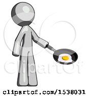 Gray Design Mascot Man Frying Egg In Pan Or Wok Facing Right