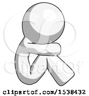 White Design Mascot Man Sitting With Head Down Facing Sideways Right