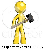 Yellow Design Mascot Man With Sledgehammer Standing Ready To Work Or Defend