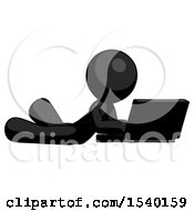 Poster, Art Print Of Black Design Mascot Man Using Laptop Computer While Lying On Floor Side Angled View