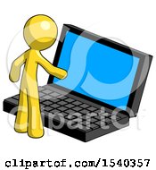 Yellow Design Mascot Man Using Large Laptop Computer