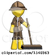 Yellow Explorer Ranger Man Standing With Industrial Broom
