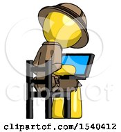 Poster, Art Print Of Yellow Explorer Ranger Man Using Laptop Computer While Sitting In Chair View From Back