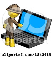 Poster, Art Print Of Yellow Explorer Ranger Man Using Large Laptop Computer