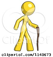 Yellow Design Mascot Woman Walking With Hiking Stick