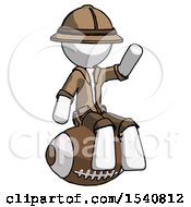 Poster, Art Print Of White Explorer Ranger Man Sitting On Giant Football