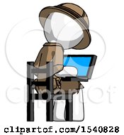White Explorer Ranger Man Using Laptop Computer While Sitting In Chair View From Back
