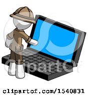 White Explorer Ranger Man Using Large Laptop Computer