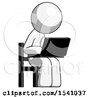 White Design Mascot Man Using Laptop Computer While Sitting In Chair Angled Right