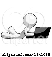 Poster, Art Print Of White Design Mascot Man Using Laptop Computer While Lying On Floor Side Angled View