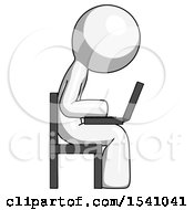 White Design Mascot Man Using Laptop Computer While Sitting In Chair View From Side