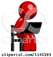 Red Design Mascot Man Using Laptop Computer While Sitting In Chair Angled Right