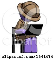 Purple Explorer Ranger Man Using Laptop Computer While Sitting In Chair Angled Right