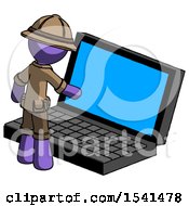 Purple Explorer Ranger Man Using Large Laptop Computer